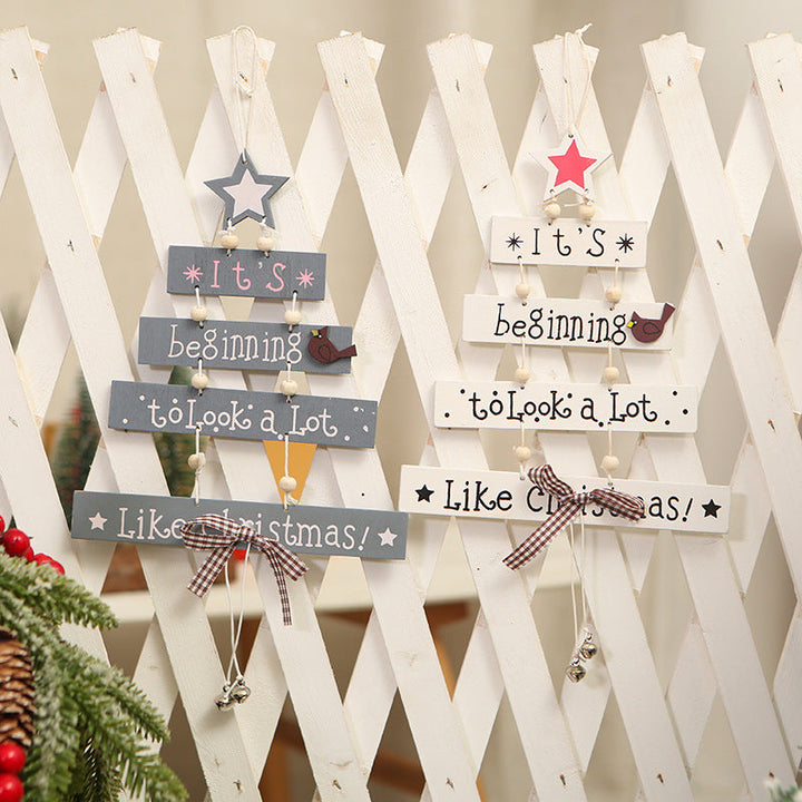 Decorative wooden sign with Christmas greeting