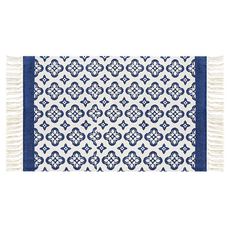 Flat-woven cotton runner with Mediterranean tile jacquard and decorative fringes