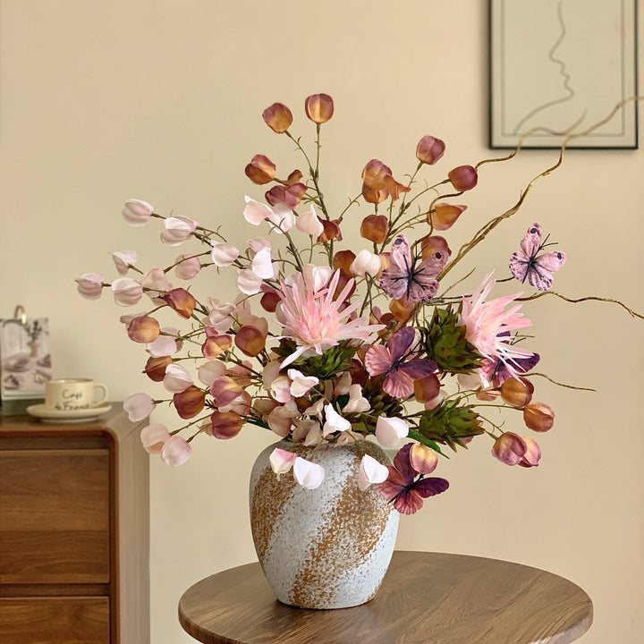 Elegant Floral Arrangement with Decorative Butterflies