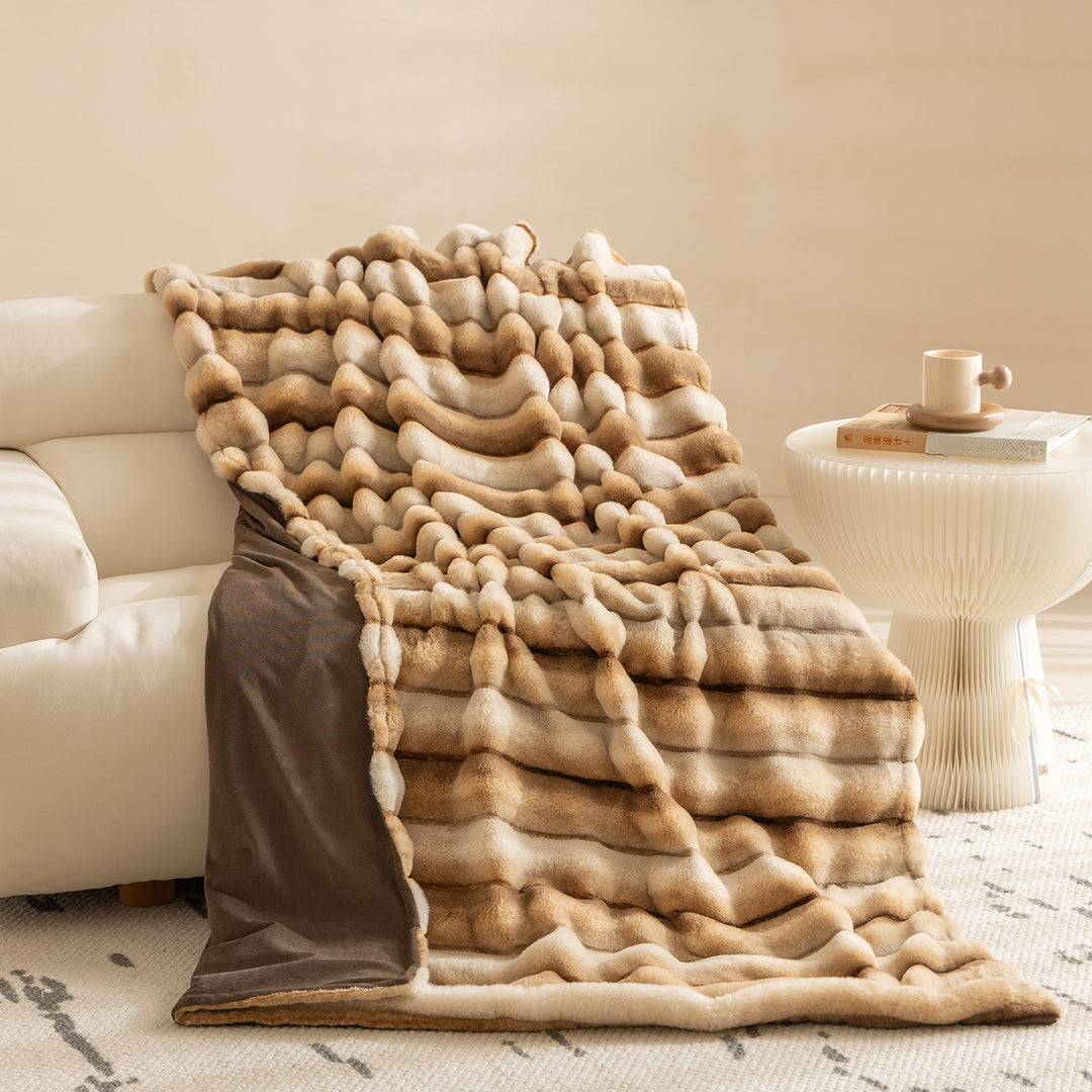 Luxurious cozy faux fur blanket with quilted relief pattern