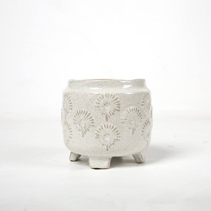 Decorative ceramic flower pot on legs