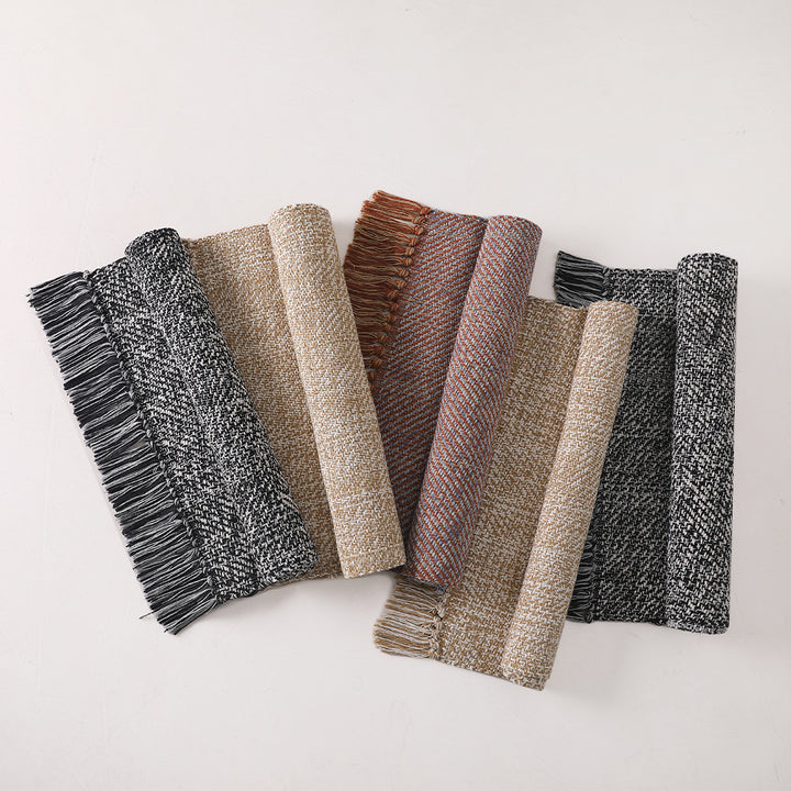 Woven table runner made of cotton blend with fine structure and herringbone look as well as decorative fringes