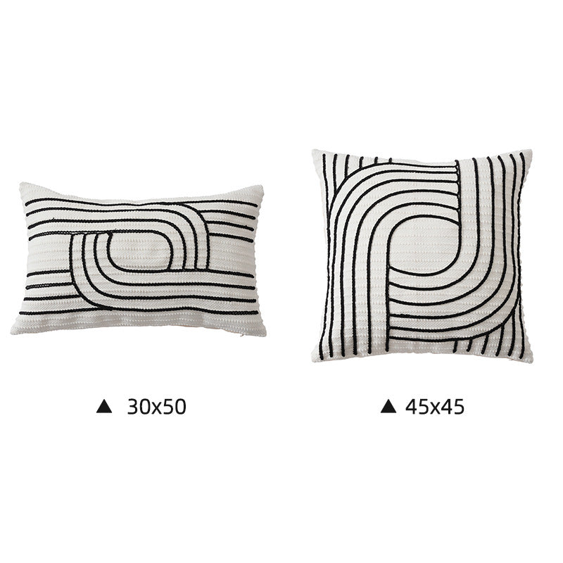 Decorative cushion cover with textured embroidery and geometric line motif