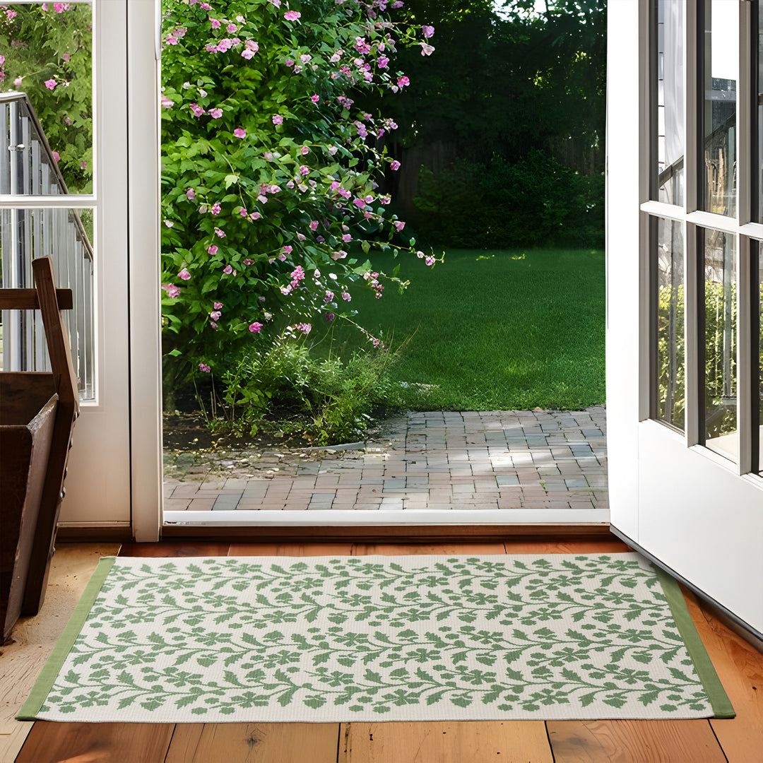 Woven table runner with floral vinyl print look and reinforced overlock stitching