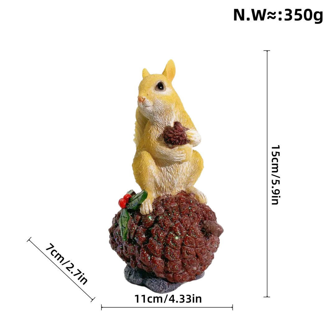Decorative squirrel sculpture on a pine cone