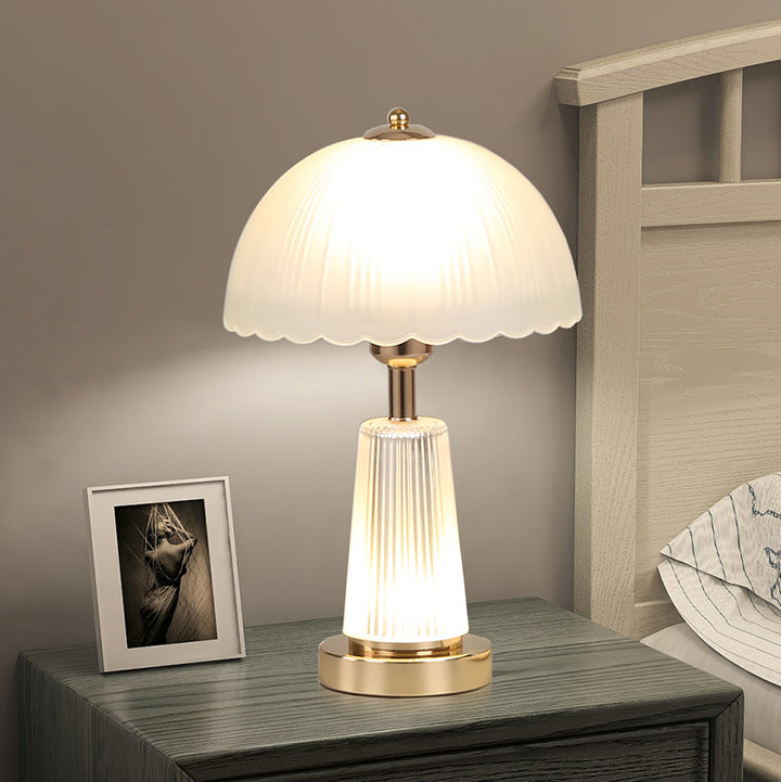 Elegant table lamp with hand-crafted flame-like shade