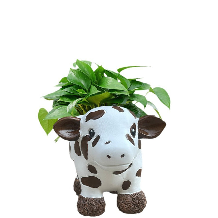 Flower pot in the shape of a cow