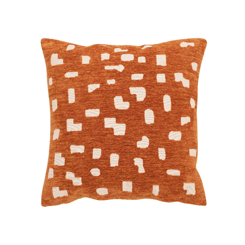 Decorative cushion with abstract pixel pattern and soft bouclé cover