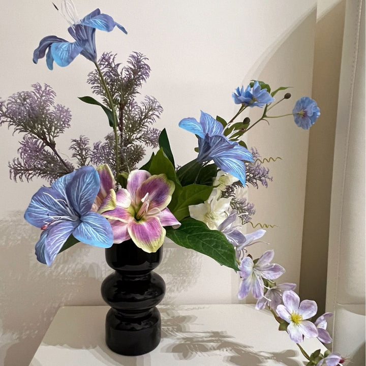 Artificial flower bouquet with fine, realistic blooms