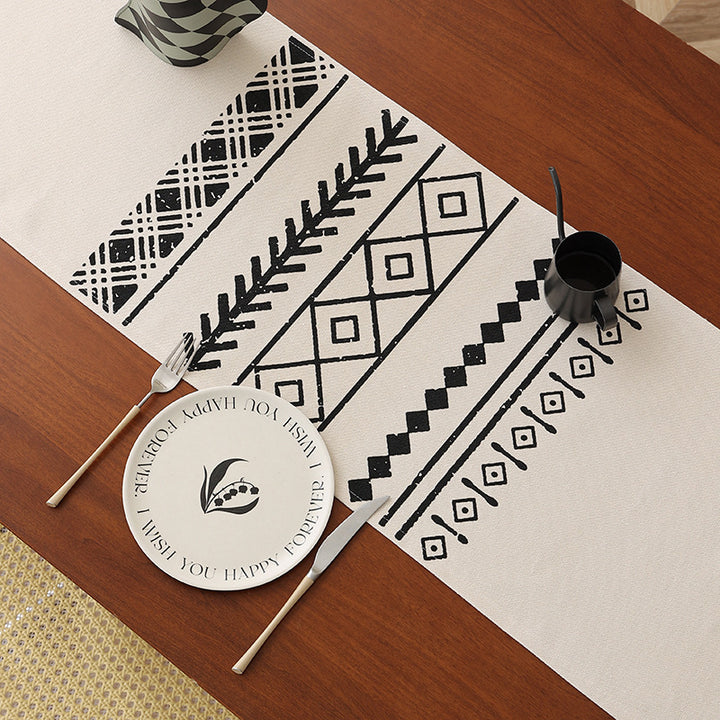 Woven table runner in Boho style with fringes and geometric ethnic print