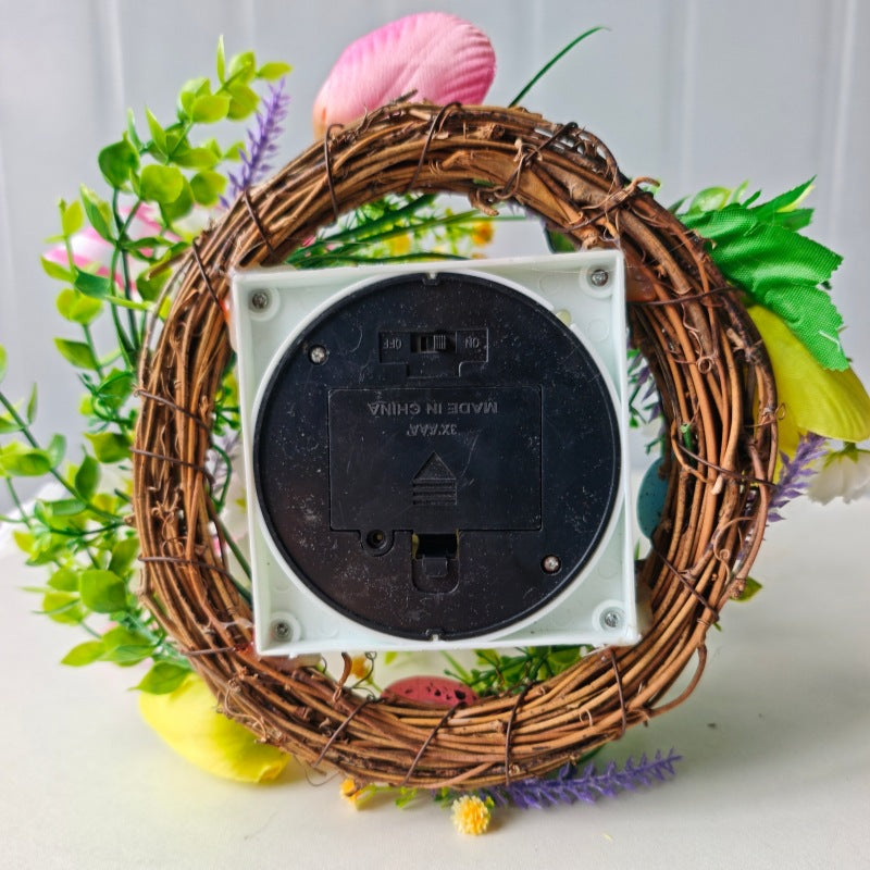 Decorative table lantern with artificial flowers and ribbon