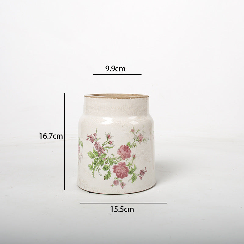 Decorative flower pot with floral decoration