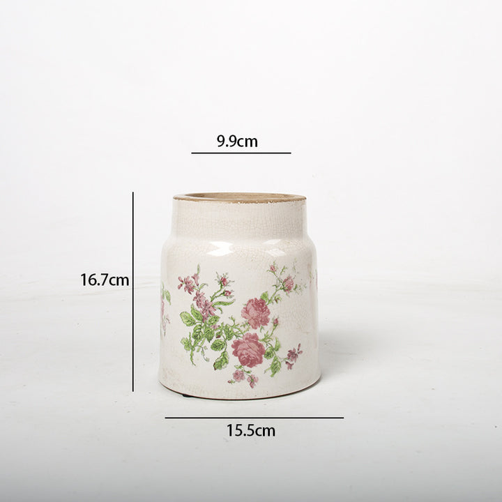 Decorative flower pot with floral decoration