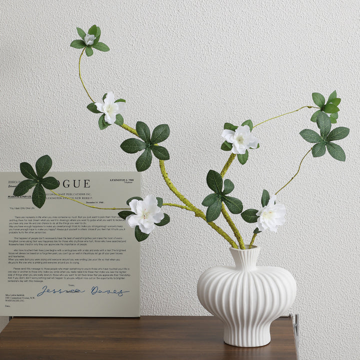 More elegant artificial flower branch with realistic blooms and leaves