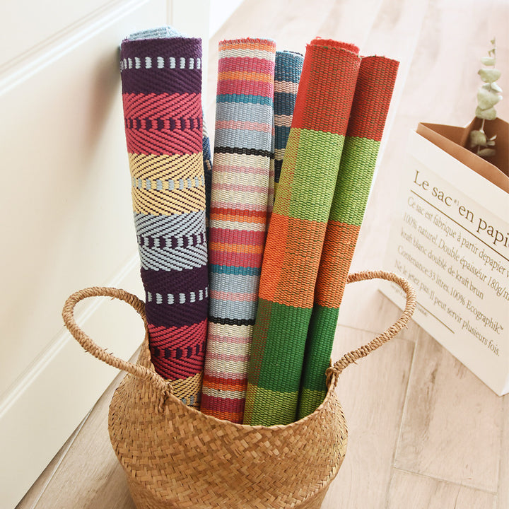 Woven colorful table runner with fringes and checkered structure