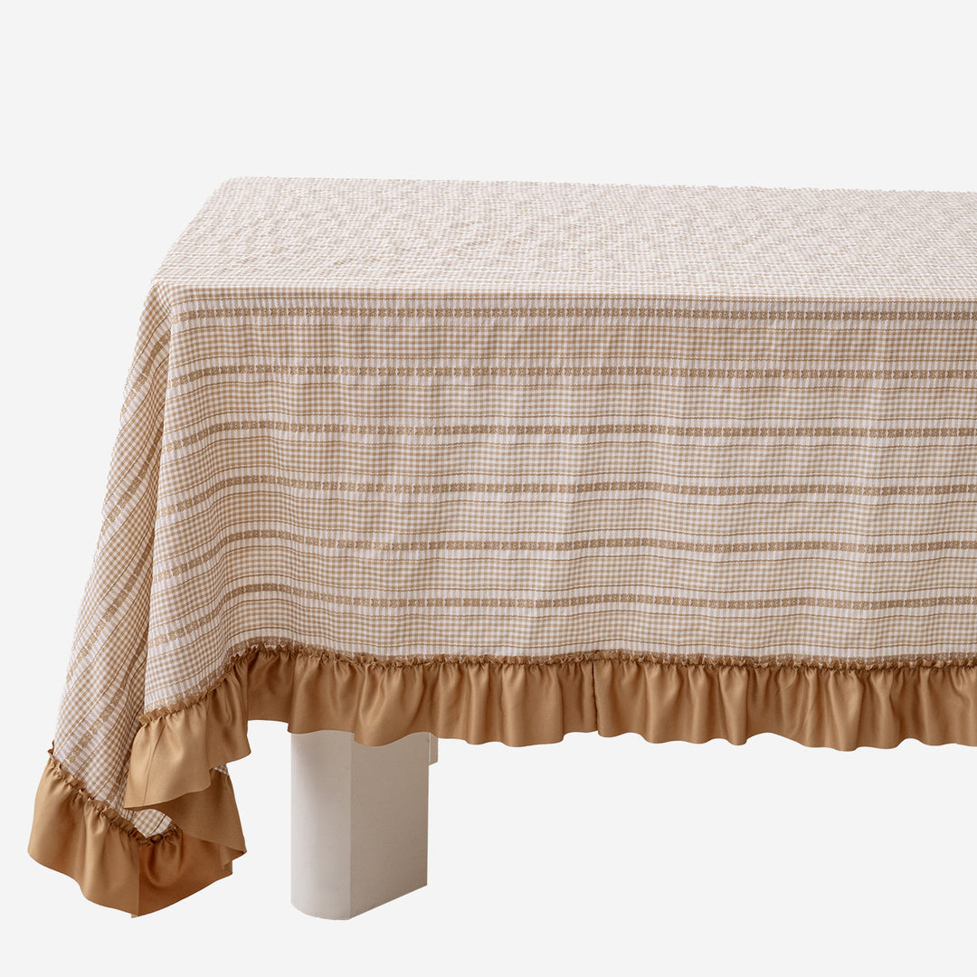 Rustic country house tablecloth made of cotton blend fabric with fine check pattern and ruffled hem