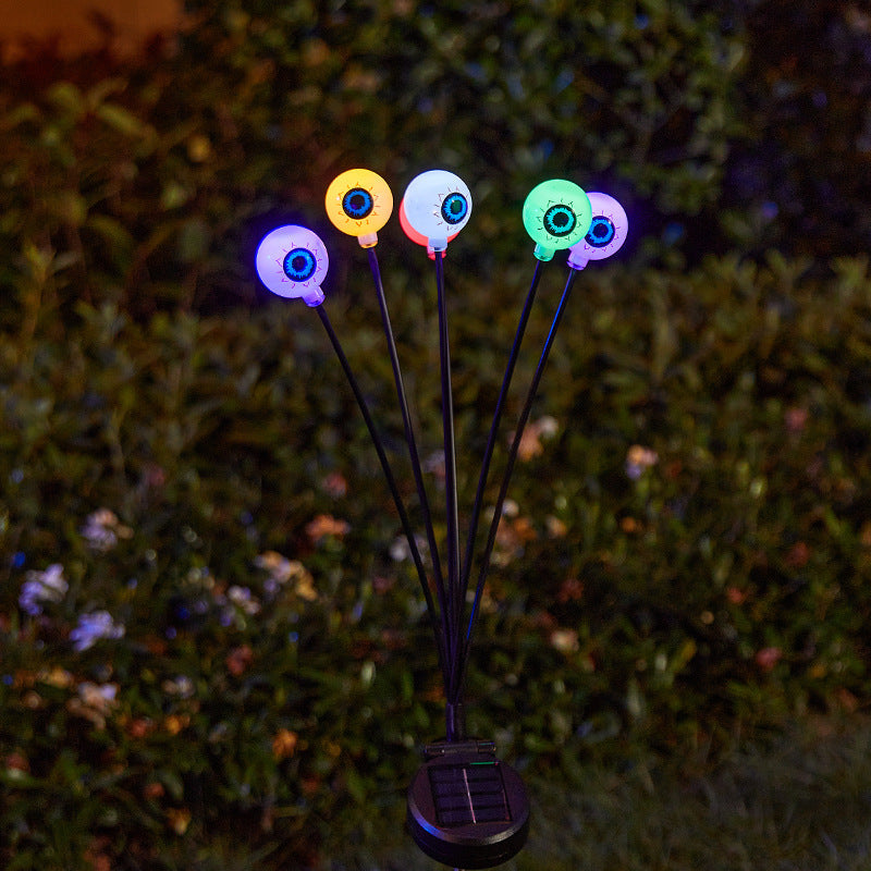 Creepy garden lights with eye motif