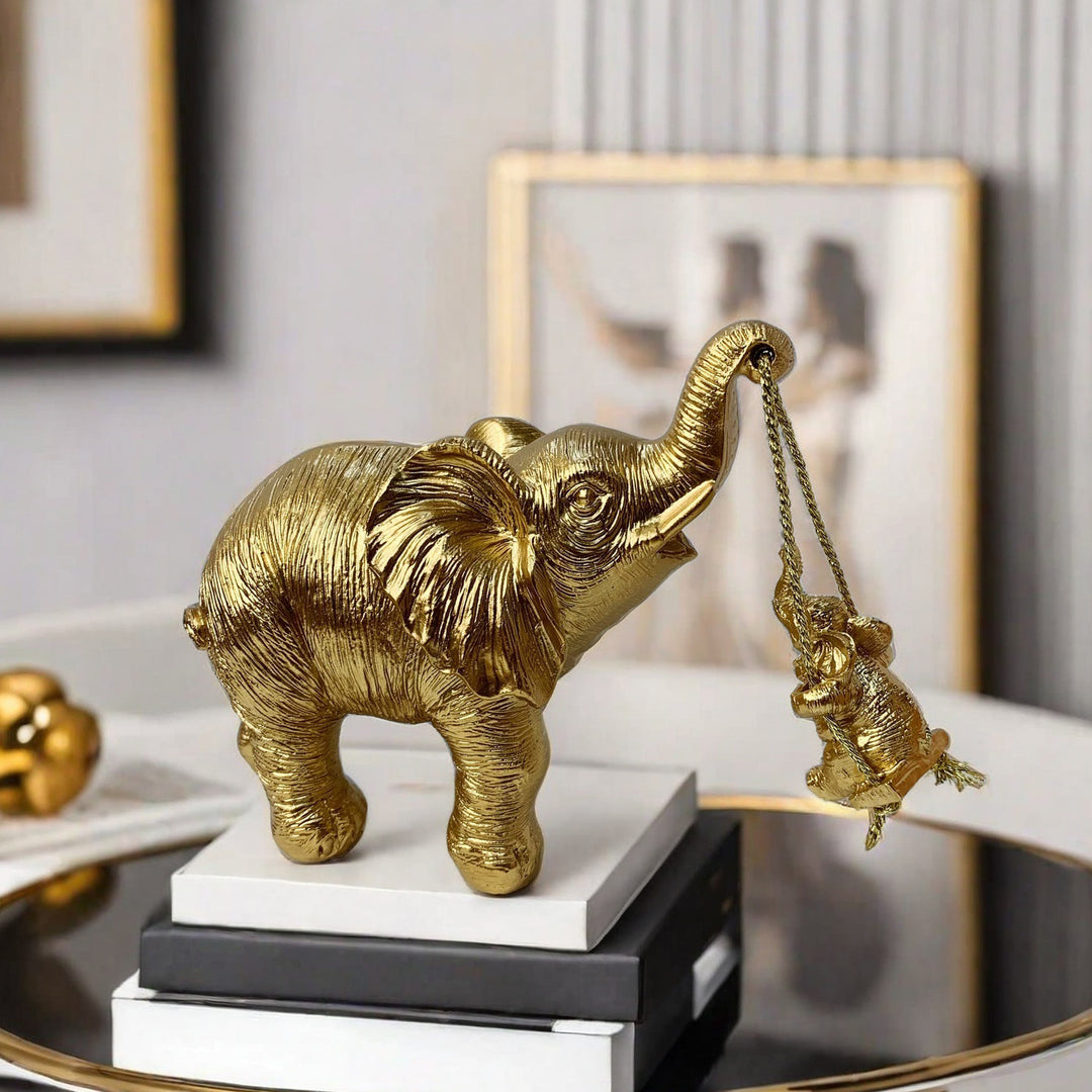 Decorative elephant figurine with child