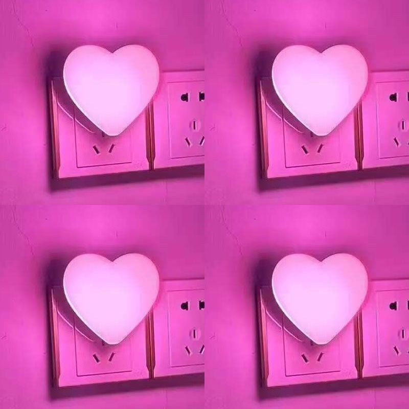 Heart-shaped plug-in ambient night light with soft LED lighting