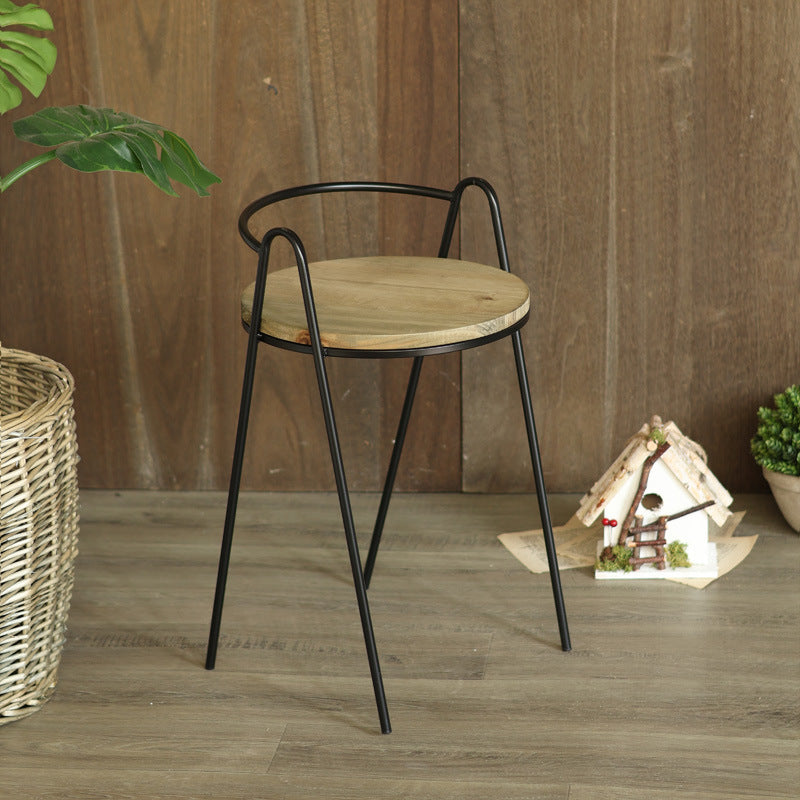 Modern stool with wooden seat and metal frame