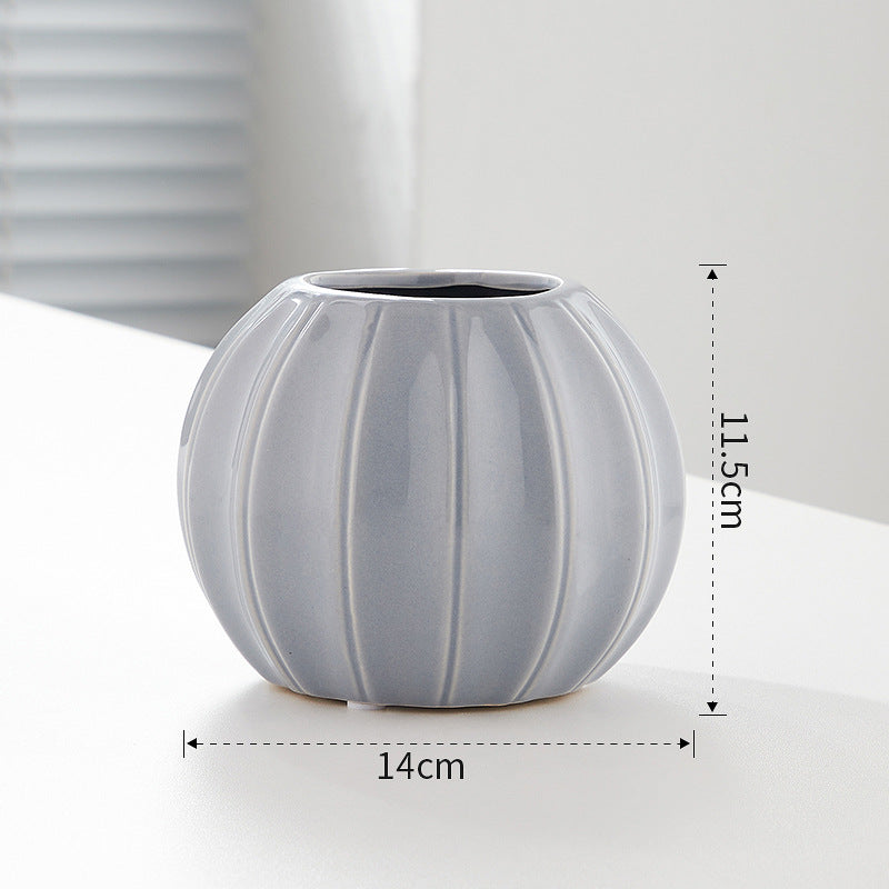 Decorative ceramic vase with modern ribbed design