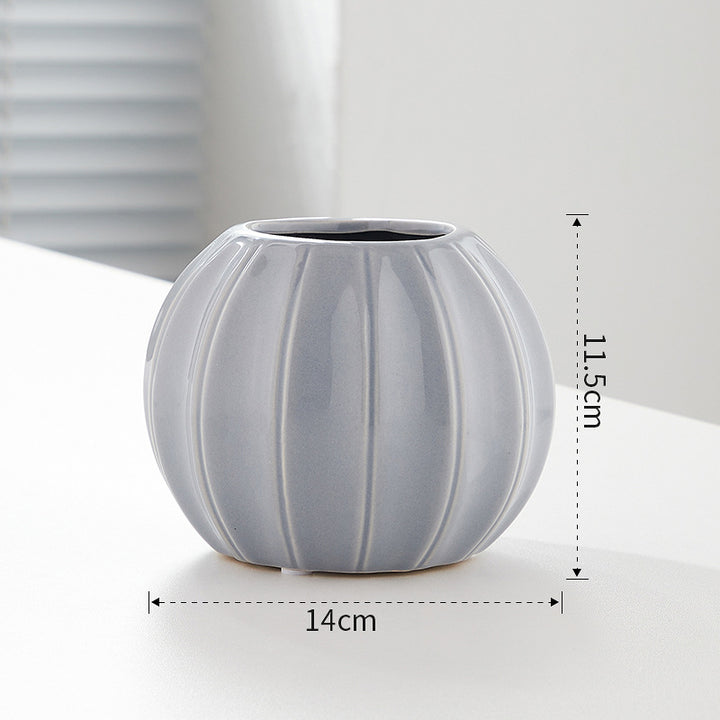 Decorative ceramic vase with modern ribbed design