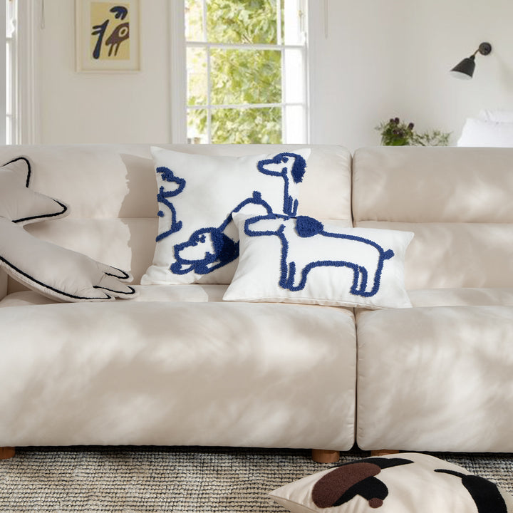 Rectangular decorative lumbar pillow with hand-tufted dog motif made of cotton blend