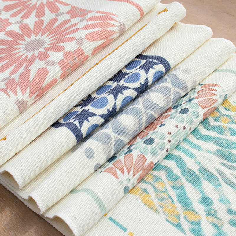 Woven rectangular table set made of cotton blend with central diamond band