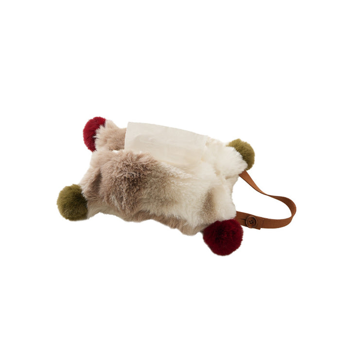 Handy tissue storage made of faux fur with leather handle and pompom