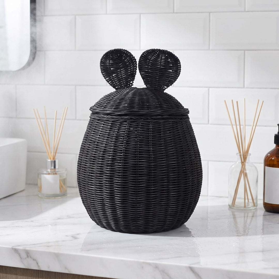 Playful storage basket with lid and ear design