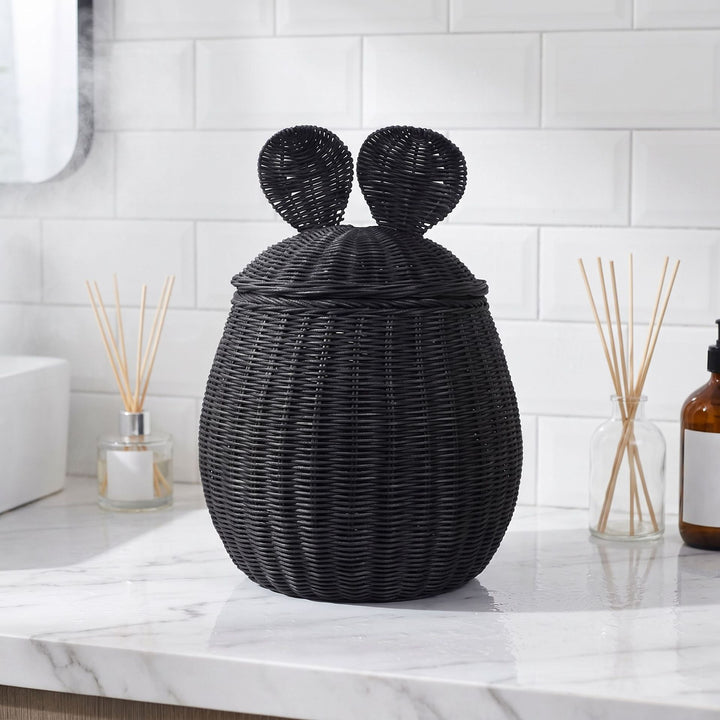 Playful storage basket with lid and ear design
