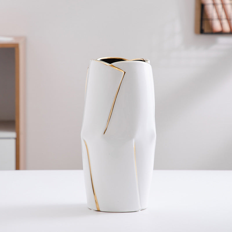 Decorative ceramic vase with golden accents