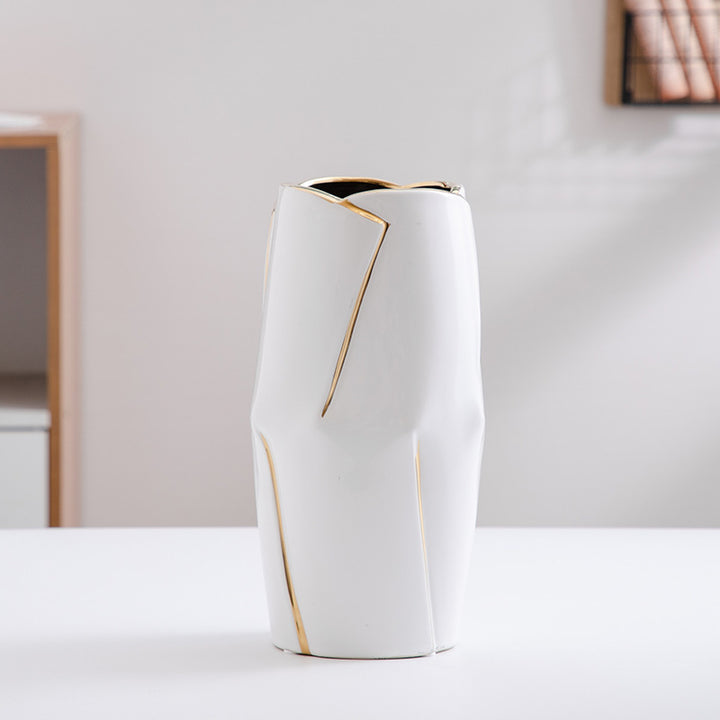 Decorative ceramic vase with golden accents