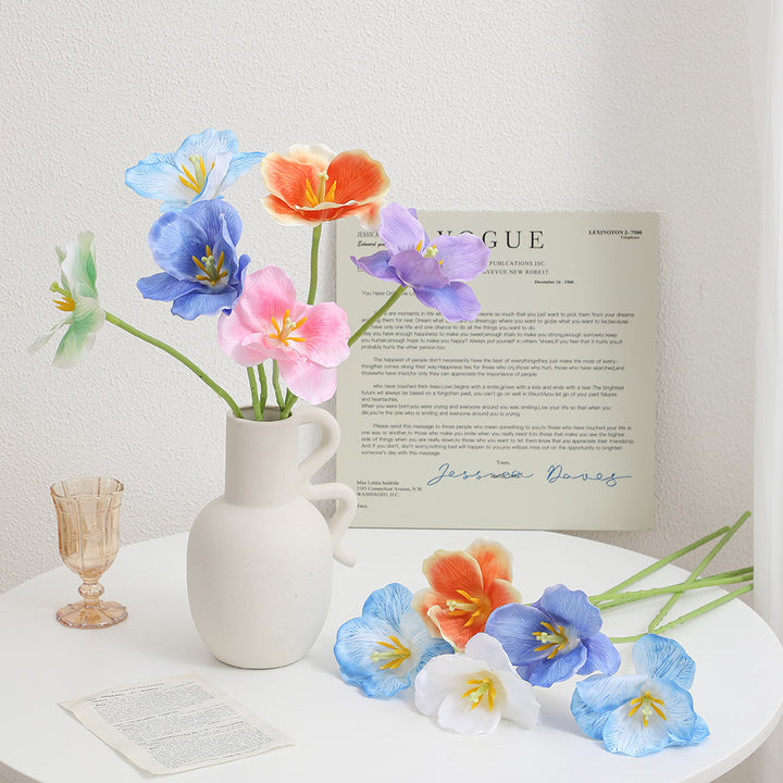 Artificial orchid flower branch with intricately detailed flowers