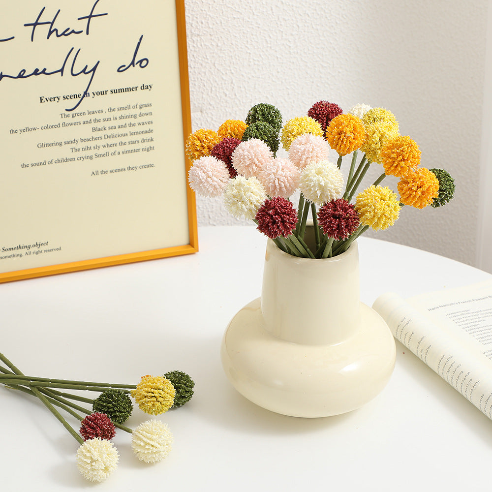 Artificial flower stem with detailed blooms