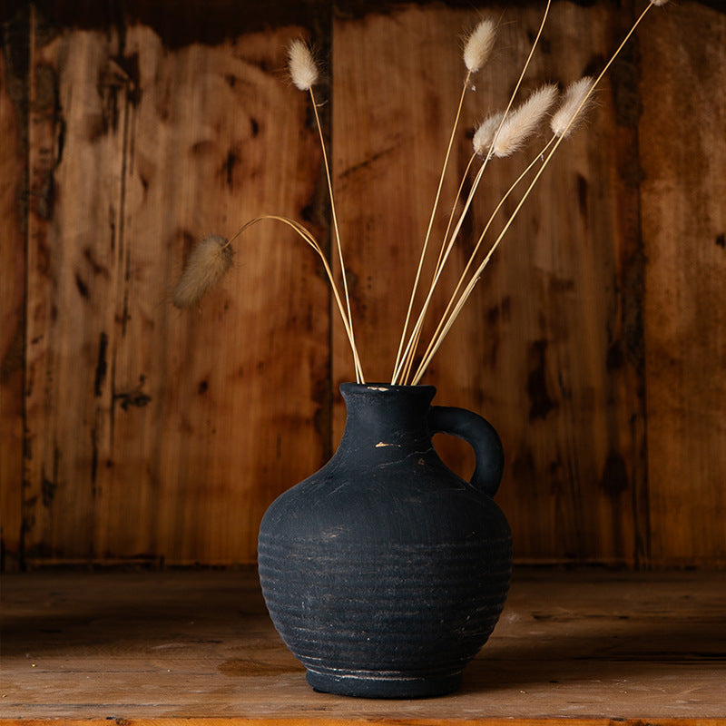 Rustic ceramic vase with handles