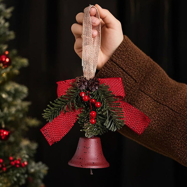 Festive Christmas bell with pine cone decoration