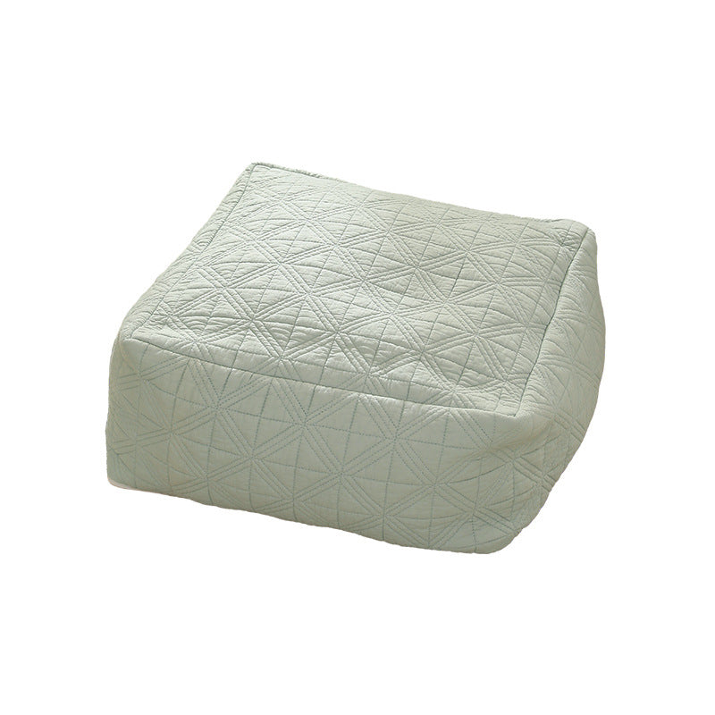 Padded floor seat pouf made of quilted cotton blend