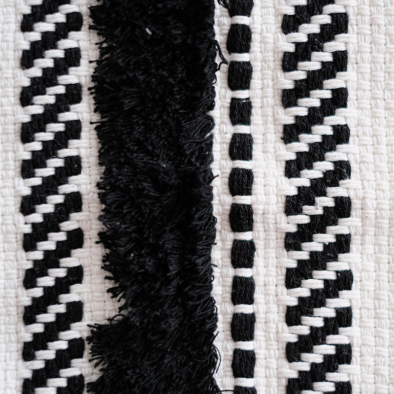 Structured living room carpet with 3D tufting and geometric diamond relief