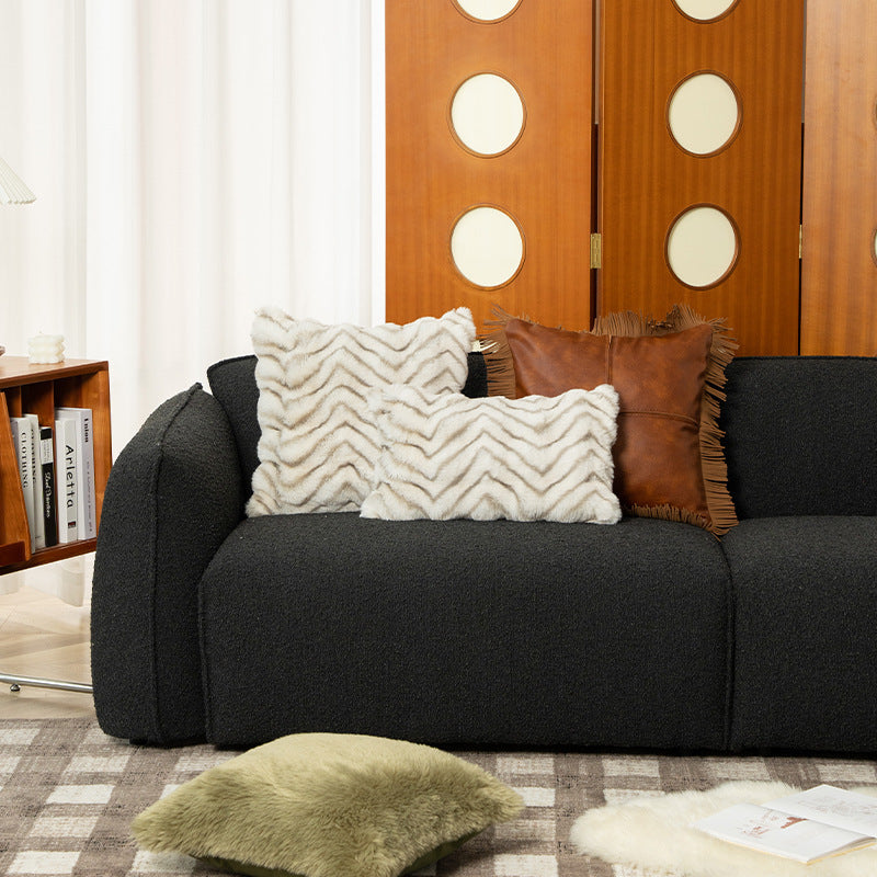 Rectangular faux fur decorative cushion with chevron relief and removable cover
