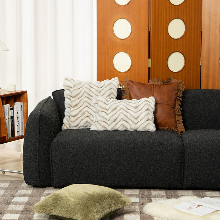 Rectangular faux fur decorative cushion with chevron relief and removable cover