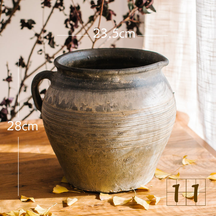 Rustic ceramic pot with handmade design