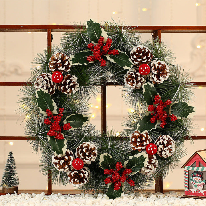 Festive Christmas wreath with pine cones and berries
