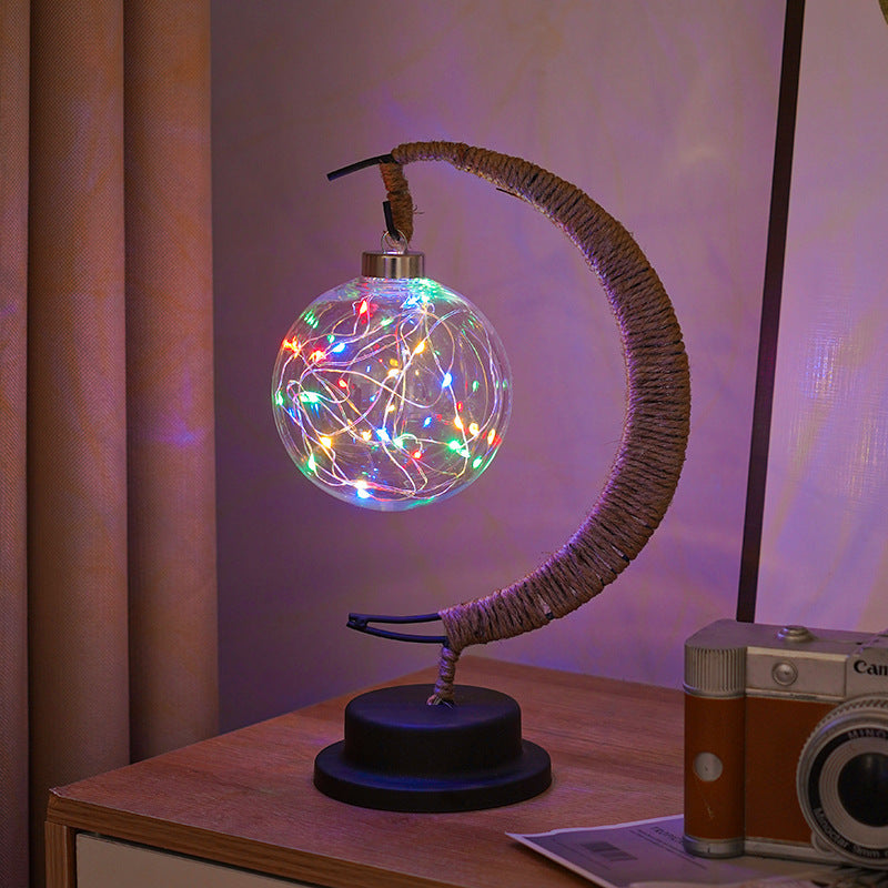 Decorative glass apple LED table lamp with moon-shaped rope-wrapped stand
