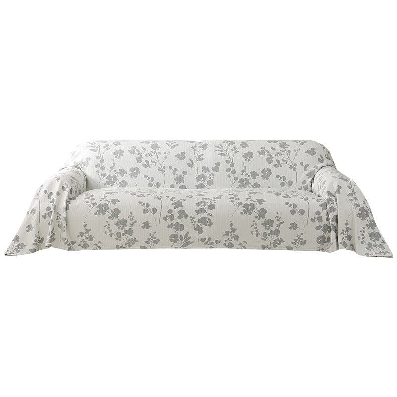Elastic sofa cover with floral relief structure and universal fit