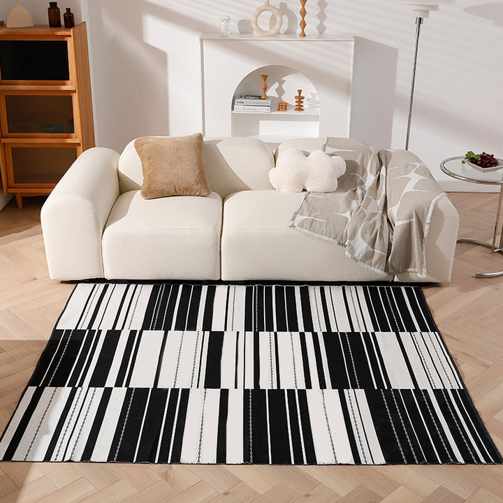 Modern flat-woven living room rug with abstract geometric design