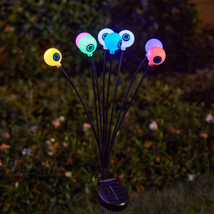 Creepy garden lights with eye motif