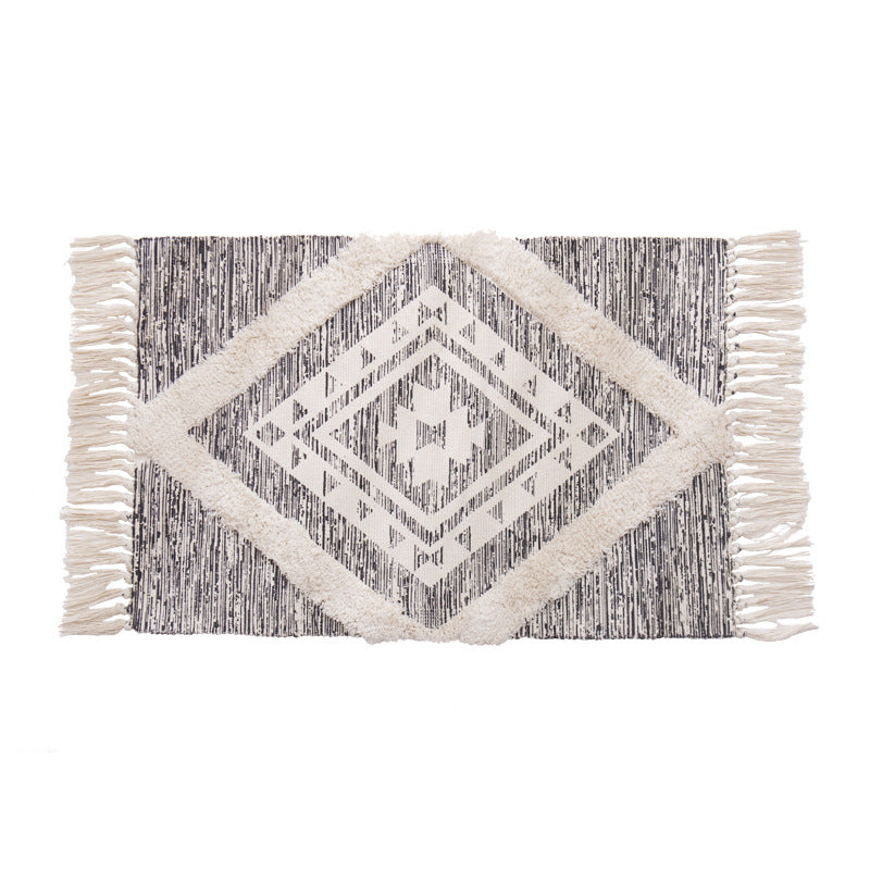 decorative woven bathroom runner with botanical jacquard pattern and fringes