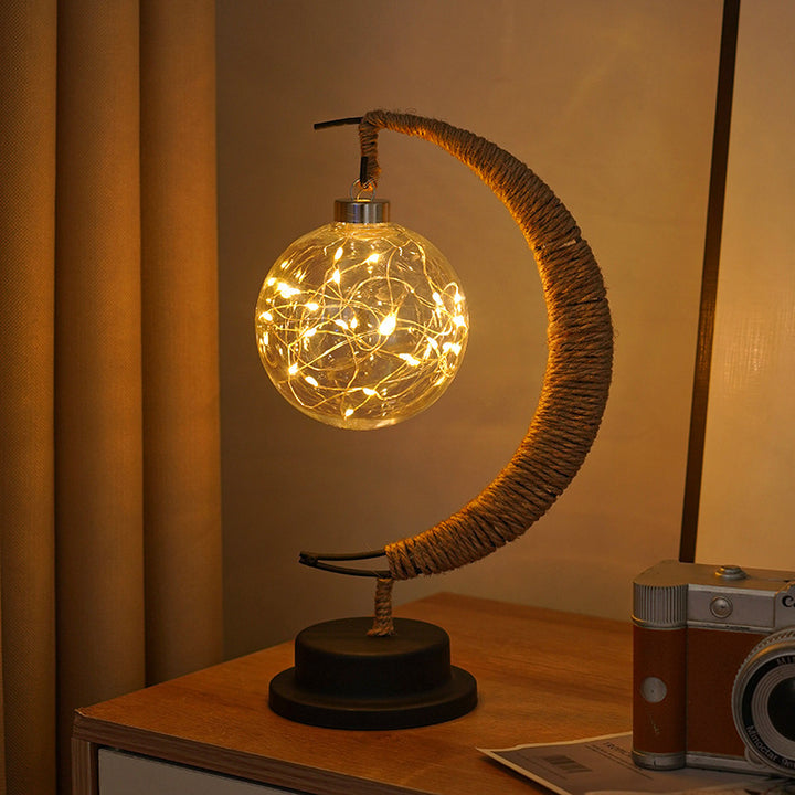Decorative glass apple LED table lamp with moon-shaped rope-wrapped stand