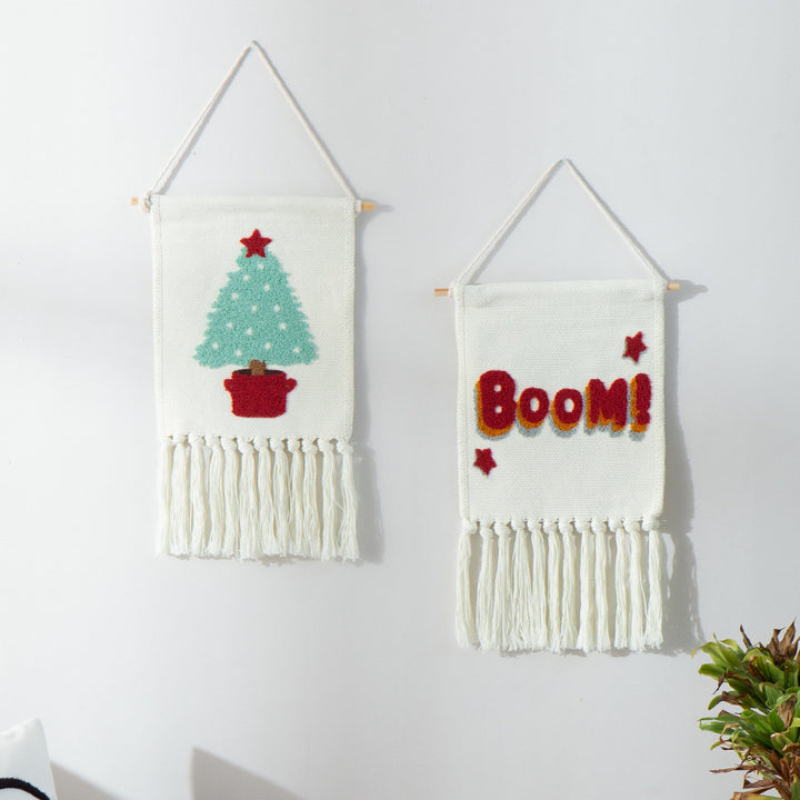 Woven cotton blend wall hanging with tufted cactus motif and cotton fringes